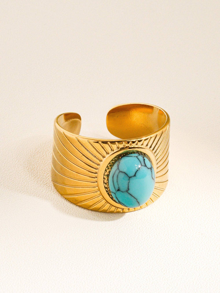 top view of Turquoise stone ring with 18K gold plating with white background