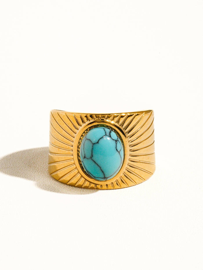 front side view of Turquoise stone ring with 18K gold plating on white background