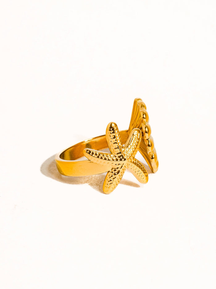 side view of Étoilé star & shell ring in 18K gold-plated stainless steel. Non-tarnish, hypoallergenic, and water-resistant—boho luxe meets celestial charm.