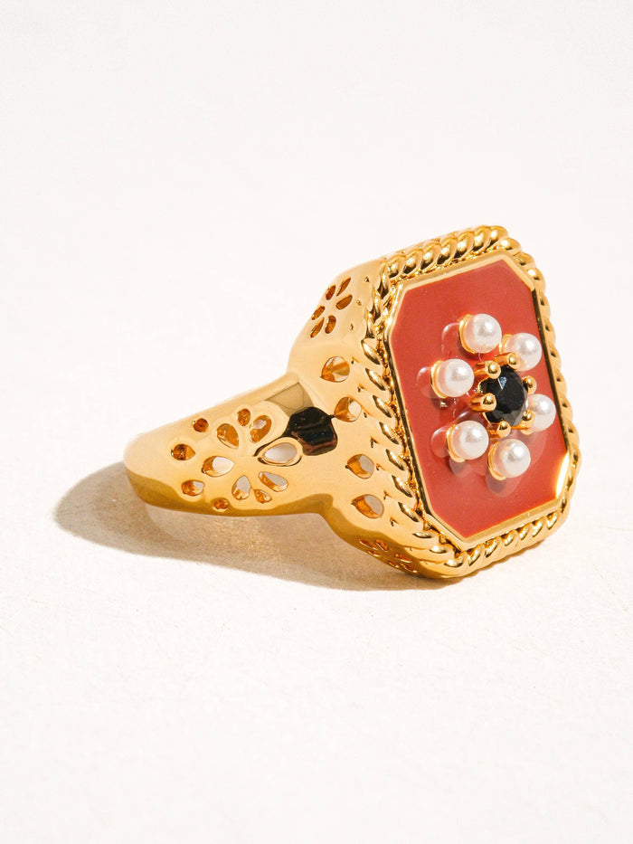 side view of close up view of Vintage red enamel ring with 18K gold plating.